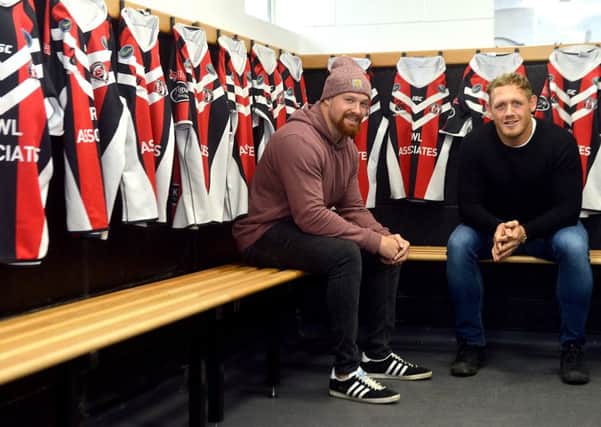 Newspaper: Wakefield Express.
Story: Normanton Knights RLFC officially open the new changing rooms and facilities. 
Pictured: Former Knights players/members L to R) Oliver Holmes - Castleford Tigers and England International Ben Westwood, sat in one of the new changing rooms.
Reporter: Alex Beard.
Photographer: Andrew Bellis
email: andrewbellisphotography@gmail.com
Twitter: @SnapperAndrewB
Mobile: 07885 426 523
Photo date: 08/02/17
Picture ref: AB038ax0217