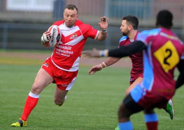 Two-try Wayne McHugh takes on the London Chargers defence in Fryston's 40-12 victory in the capital today. Picture: Matthew Merrick.