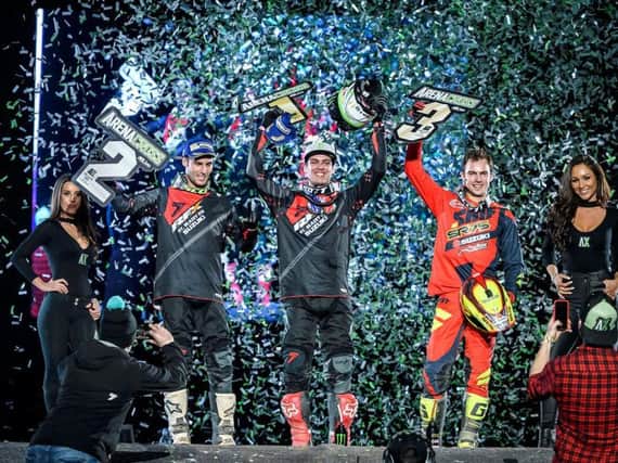 Arenacross UK 2017 Tour Sheffield Arena Pro winner Cedric Soubeyras, centre, celebrates with with second placed Angelo Pellegrini and third Thomas Ramette.