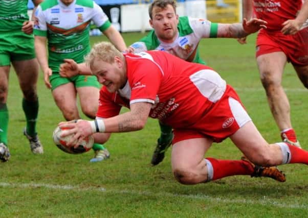 Fryston's Steve Scott, pictured scoring a try in the Challenge Cup tie against Keighley, has been suspended from rugby league at all levels until June 30. Picture: Matthew Merrick.