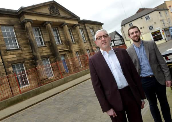 WELCOME NEWS: Chairman of Pontefract Civic Society, Paul Cartwright and society secretary Karl Gilbert, outside the old court building which will be brought back into use.