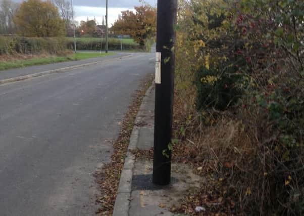 The BT pole in South Hiendley, which is blocking the path.