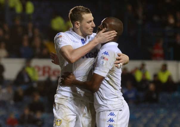 Chris Wood celebrates his second goal with Leeds United team-mate Souleymane Doukara.