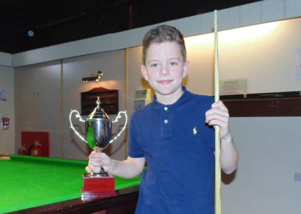 Eleven-year-old Bailey Fisher won the handicap singles final.