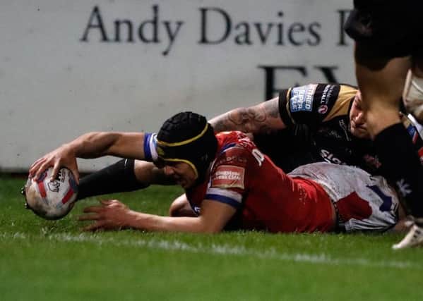 Wakefield's Ben Jones-Bishop scores a try during the Betfred Super League match at Belle Vue, Wakefield, against Salford.