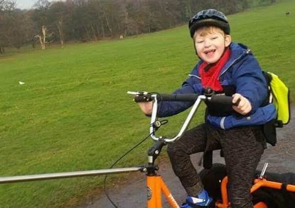Little Ellis will raise money for two causes close to his heart with a sponsored ride.