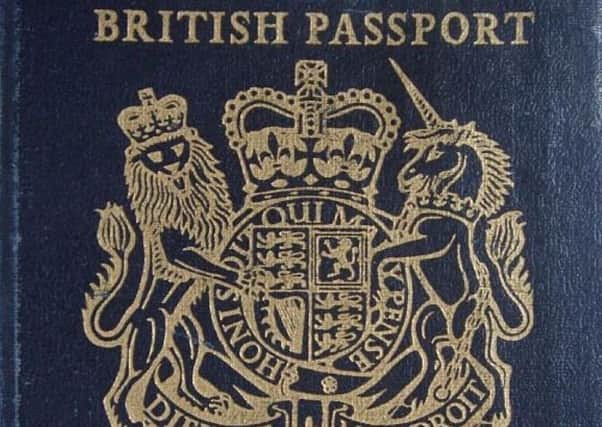 The old dark blue passport