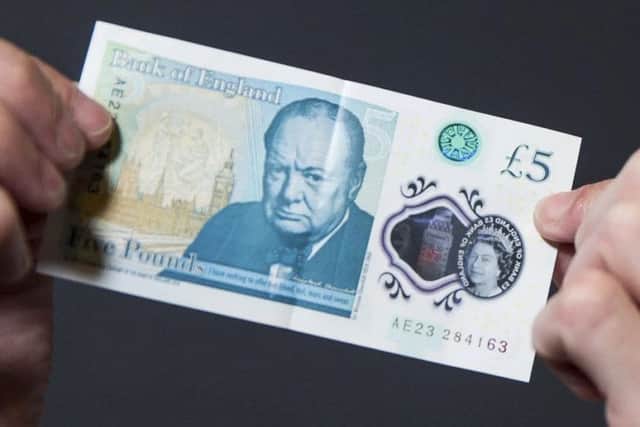 The new five pound notes