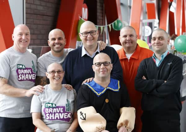 Charity headshave and fun day at Castleford bus station in memory of driver David Teasdale. In aid of Macmillian and Little Princess Trust.
Peter Taylor, Liam Needham, Craig Holmes, Steve Boyland, Andy Walter, Darren Jones and Tracy Fenton