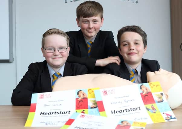 Three year 7 pupils from St Wilfreds Catholic High school helped save a life after having first aid training at the school. Ben Grove, Finlay Weir and Harvey Symons.