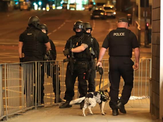 Armed police in Manchester on Monday night