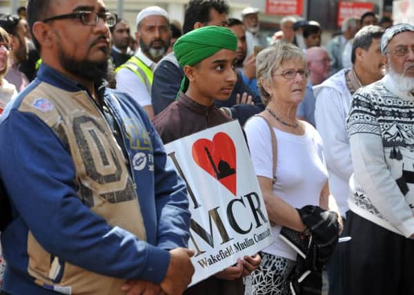 Crowds gathered in Wakefield for today's vigil. Pictures: Tony Johnson