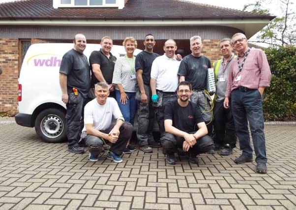 BRIGHT SPARKS: A group of electricians from WDH have volunteered their time at Wakefield Hospice.