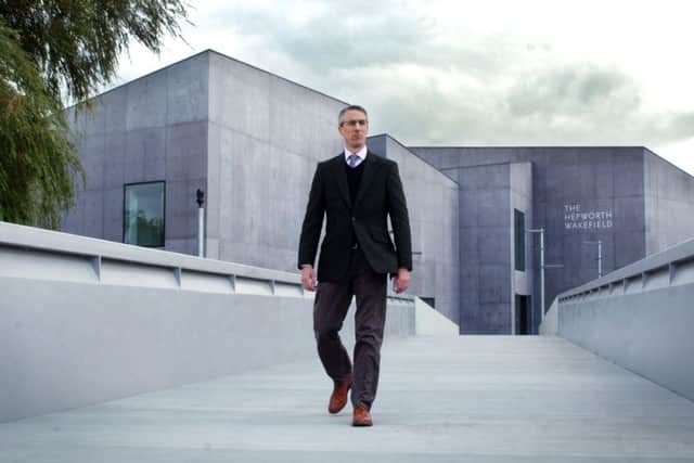 Director of The Hepworth, Simon Wallis in front of the building.
