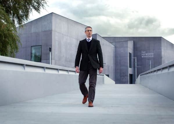 Director of The Hepworth, Simon Wallis in front of the building.