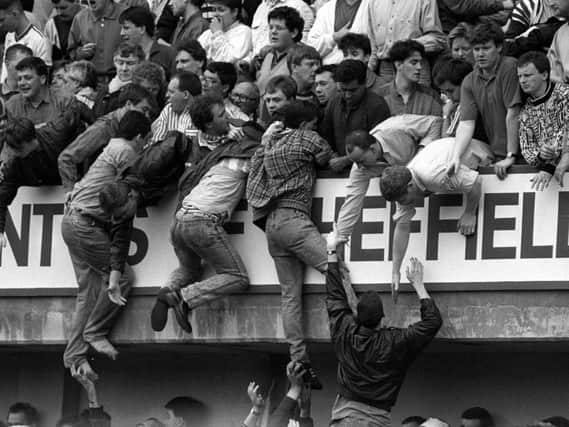 Fans trying to avoid the crush at Hillsborough in 1989