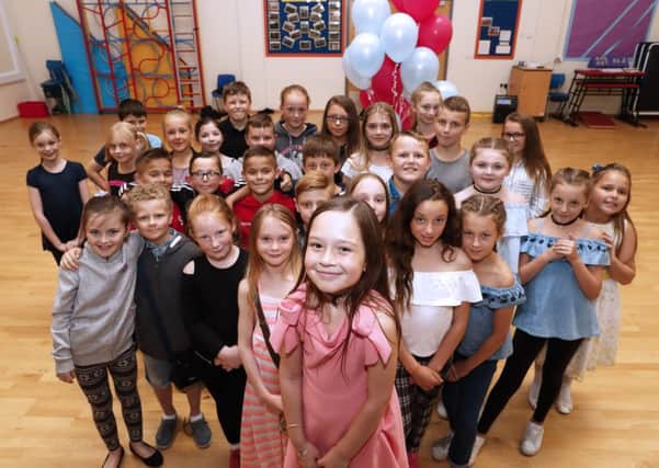 Grace Liddle, who was at the Ariana Grande concert when the bomb was detonated has organised a charity school disco to raise money for the victim fun and to go towards creating a memorial garden at the school.
