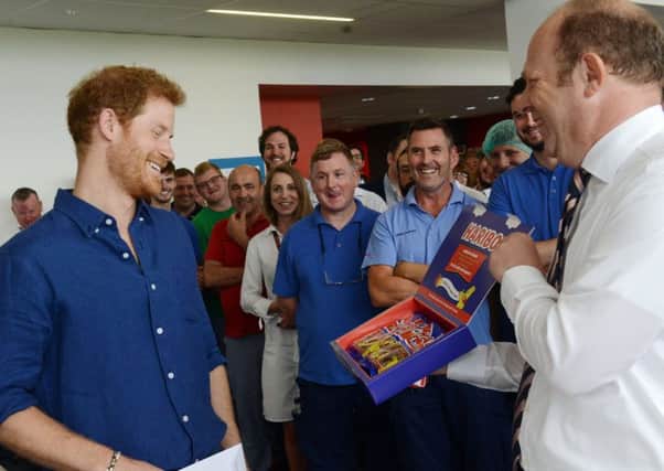 7 July 2017..........HRH Prince Harry is presented with some specially produced 'Harry-Mix' during a visit to the Haribo factory in Castleford. Picture Scott Merrylees