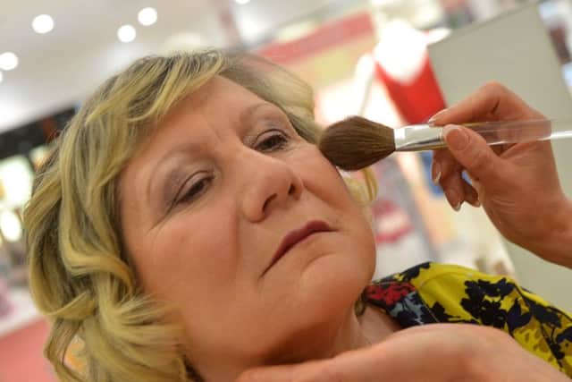 PAMPERING: Angela Brookes during the makeover process at Trinity Walk.
