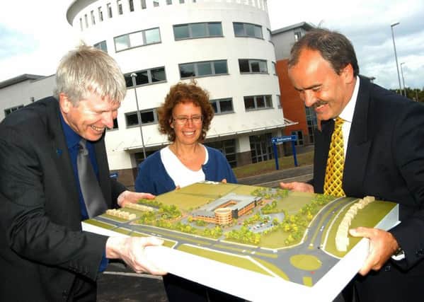Leeds officials celebrate the opening of the new PFI Lawnswood School building in 2003.