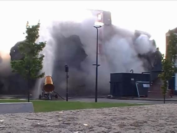 Gone: Rishworth Street multi-storey car park was demolishedduring a controlled explosion on Sunday morning