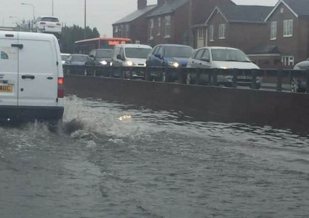 Flooding at Denby Dale Road by Helen Feeley