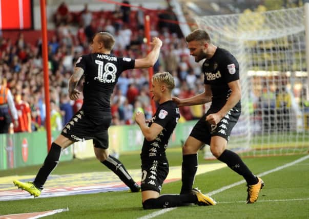 Leeds United players celebrate after Ezgjan Alioski scores the second goal at Nottingham Forest. Picture: Simon Hulme