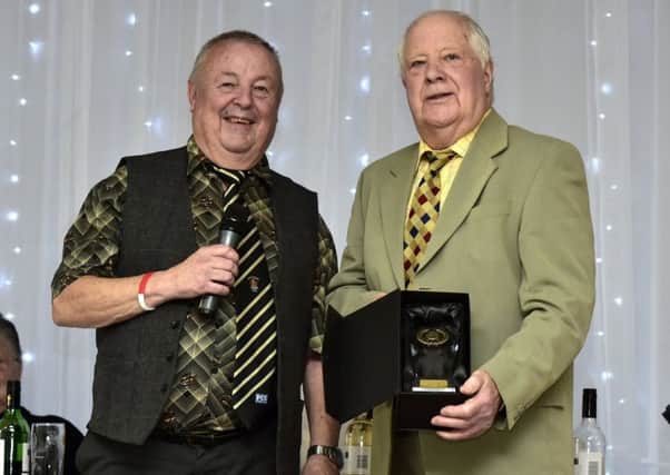 Secretary John Kendrew with Keith Howe and his 2017 Tiger of the Year award, which he was presented with at the Castleford RL Players Association 2017 reunion. Picture: Matthew Merrick