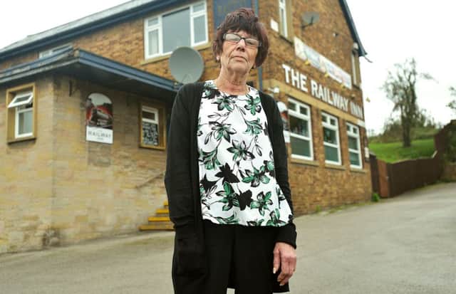 Newspaper: Pontefract & Castleford Express.
Story: The Railway Inn on Mill Dam Lane, Pontefract, has been earmarked for demolition by the land owners to make way for new housing.
Pictured: Landlady Maggie Senior.
Reporter: Nick Frame.
Photographer: Andrew Bellis
email: andrewbellisphotography@gmail.com
Twitter: @SnapperAndrewB
Mobile: 07885 426 523
Photo date: 21/10/17
Picture ref: AB247a1017