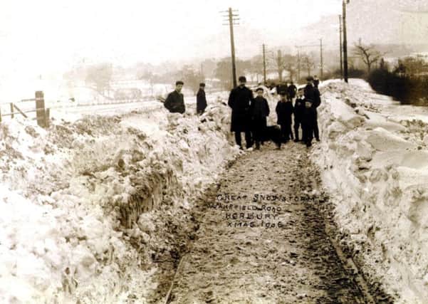 The great snow storm of 1906 at Wakefield Road, Horbury. 
Picture courtesy of Gordon Berry whose ancestors are featured on it.