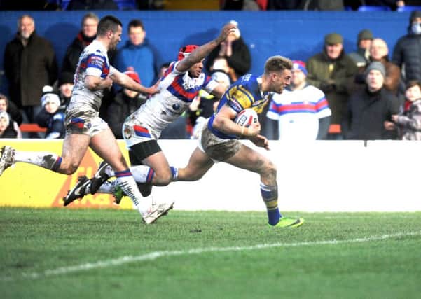 Jack Ormondroyd touches down for Leeds Rhinos against Wakefield Trinity. PIC: Steve Riding