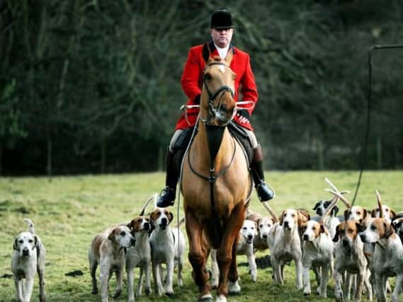 The Badsworth and Bramham Moor Hounds Boxing Day hunt meet in Aberford village.
