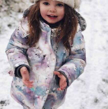 Amelia Mae Fraser-Currie enjoys the snow at Pugneys Park.Picture by mum Jade Unal.