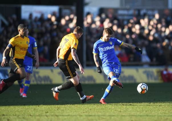 Mateusz Klich, aims a pass for Leeds United in their FA Cup defeat at Newport County. Picture James Hardisty.