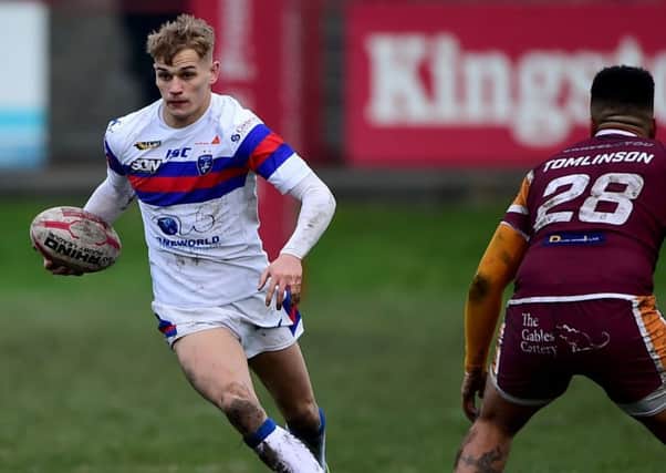 Luke Hooley on the attack for Wakefield Trinity. Pic: Paul Butterfield