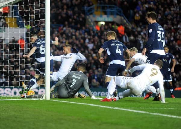 Kemar Roofe puts the ball in the net from a goalmouth scramble against Millwall. Picture: Tony Johnson.