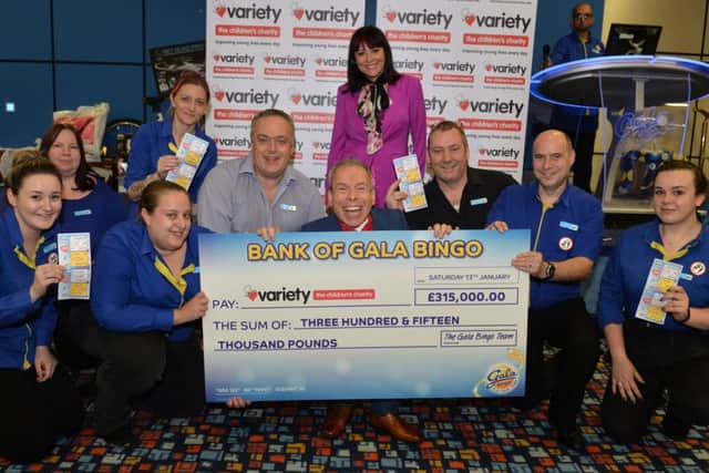 January 2017
NEWS RELEASE
Warwick with  Caroline Monk variety Club and Staff From Gala Bingo 
Gala Bingo Peterborough celebrates with Warwick Davis whilst presenting a cheque for  Â£315,000 to Variety, The Childrens Charity

Gala Bingo celebrated in its Peterborough club this weekend , having raised  Â£315,000 since it launched its Charity game nearly six months ago  for Variety, The Childrens Charity. Gala Bingo originally aimed to raise Â£250,000, but due to the generosity of its staff and customers throughout the Company, they managed to exceed this total.   As the game has a further two months to go they expect the final total to be nearer Â£400,000!  These fundraising efforts will go towards a pledge made by The Bingo Association to raise a staggering one million pounds by the end of 2018.  warwick davis received  the cheque on behalf of the Charity on Saturday from John Hempstead the club manager. ?
The money raised by the new game will go to sponsoring  Variety Sunshine coaches, fund a number of grants