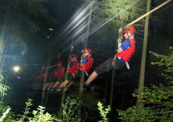 Try zip wiring in the dark at Go Ape, Dalby Forest