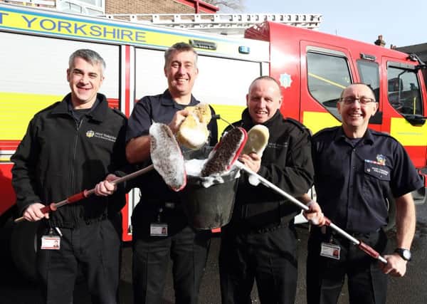 Castleford firefighters are doing a charity car wash to raise funds for the Firefighter's Charity