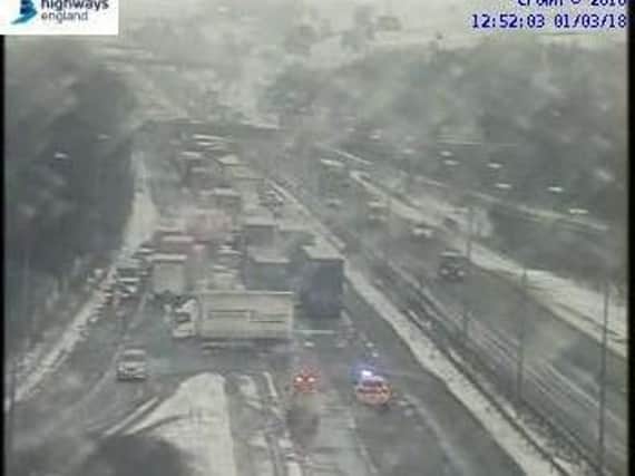 One of the earlier incidents involving an overturned lorry on the M62. Picture: Highways Agency