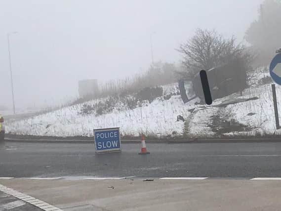 A car flipped sideways on the M62 eastbound near junction 24, at Ainley Top. Picture: West Yorkshire Police Roads Policing Unit (Twitter).