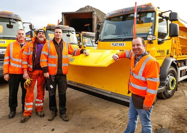 Wakefield Council's Coun Matthew Morley (right) with a team of gritters.