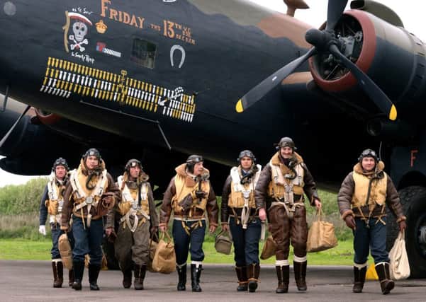 Re-enactment: The Halifax bomber and air crew reenacted by The RAF At War group.