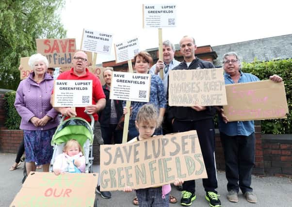 Action group Save Lupset Greenfields holding protest over hundreds of new houses proposed on their doorstep, close to Snapethorpe school and busy road Broadway.
