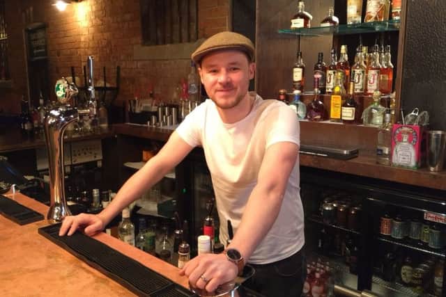New bar manager, Tom Baker.