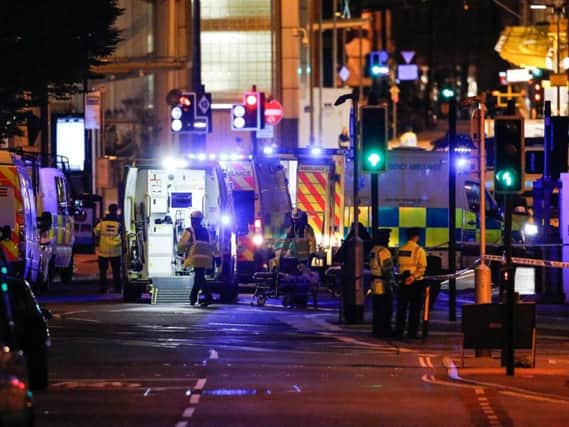 Emergency services working at the scene of the Manchester Arena Bombing. Picture: SWNS