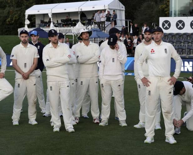 England captain Joe Root, right, stands with his team following the final day of the second Test against New Zealand at Hagley Oval. Picture: AP/Mark Baker