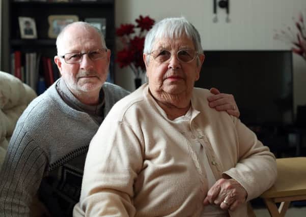 TRAVEL FEARS: Bob and Shirley Stocker are concerned by the closure of their local GP surgery.