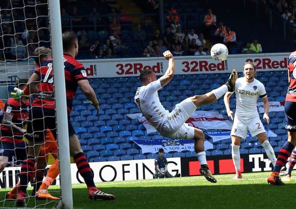 Kemar Roofe opens the scoring with an ovehead kick for Leeds United against QPR. Picture: Jonathan Gawthorpe