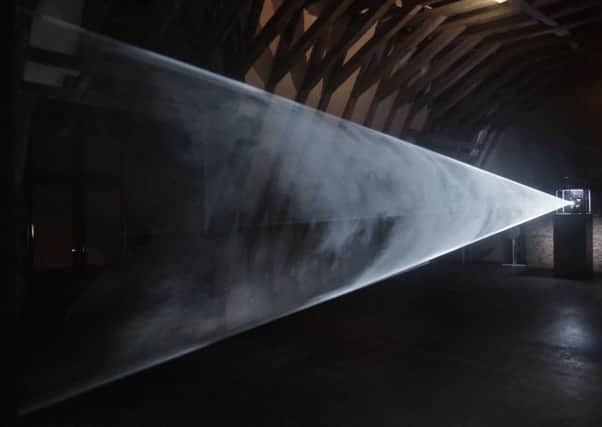 Anthony McCall, "Line Describing a Cone" (1973), during the twenty-fourth minute. Installation view at the Musee de Rochechouart (2007). Photograph by Freddy Le Saux. Courtesy Sean Kelly Gallery, New York, Galerie Thomas Zander, Cologne, GalerieÂ Martine Aboucaya, Paris.